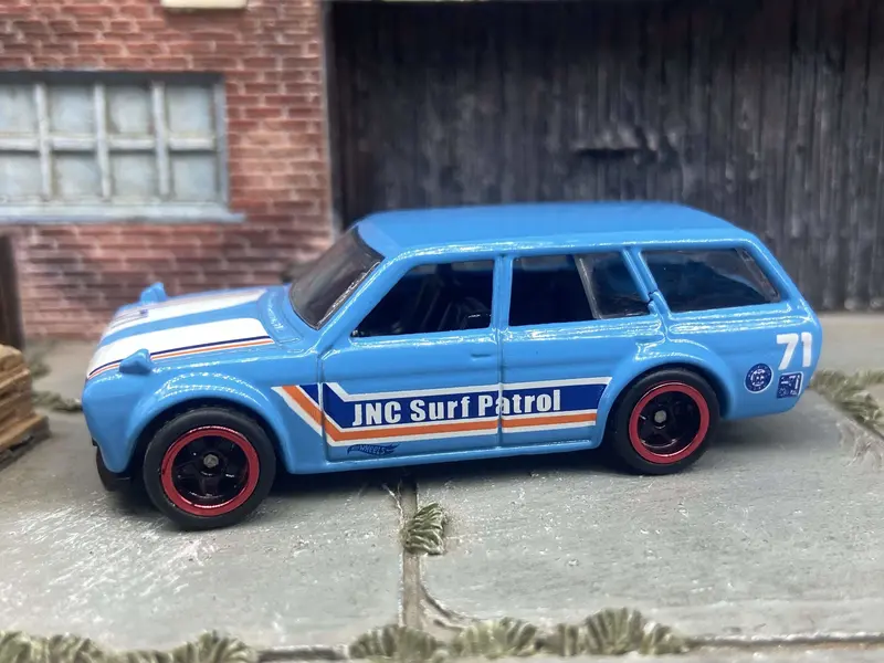 Custom Hot Wheels 1971 Datsun 510 Wagon In Light Blue And White With Black And Red 5 Spoke Wheels With Rubber Tires 1