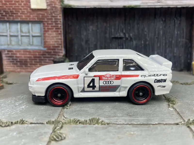 Custom Hot Wheels 1984 Audi Sport Quatro In White Red And Green Livery With Black And Red 4 Spoke Race Wheels With Rubber Tires 2