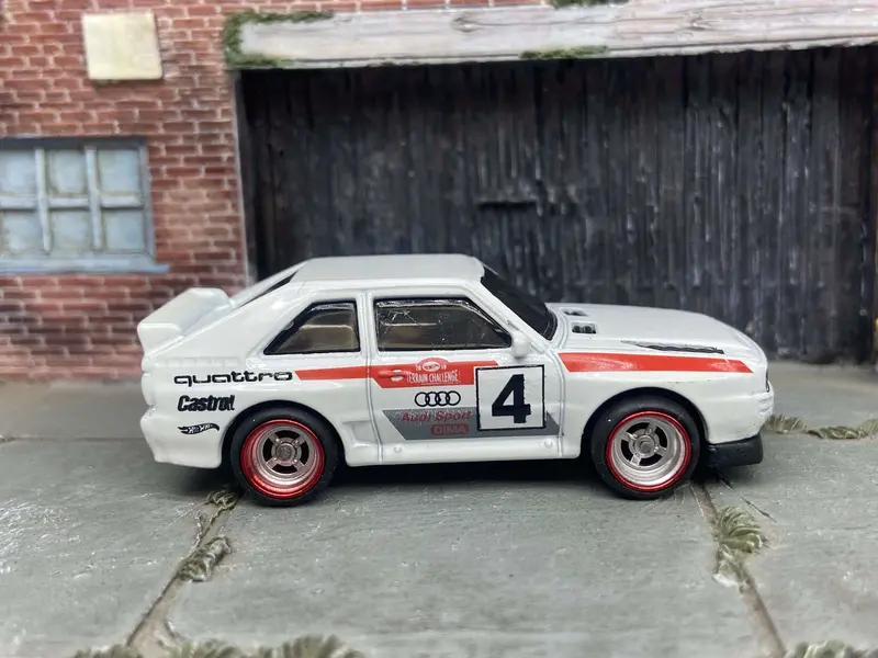 Custom Hot Wheels 1984 Audi Sport Quatro In White Red And Green Livery With Chrome And Red 4 Spoke Race Wheels With Rubber Tires 1