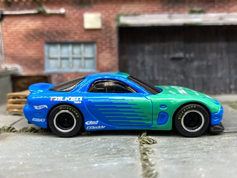 Custom Hot Wheels 1995 Mazda Rx7 In Blue And Green  Falken Tires With Black And Chrome Steel Wheels With Firestone Tires 1