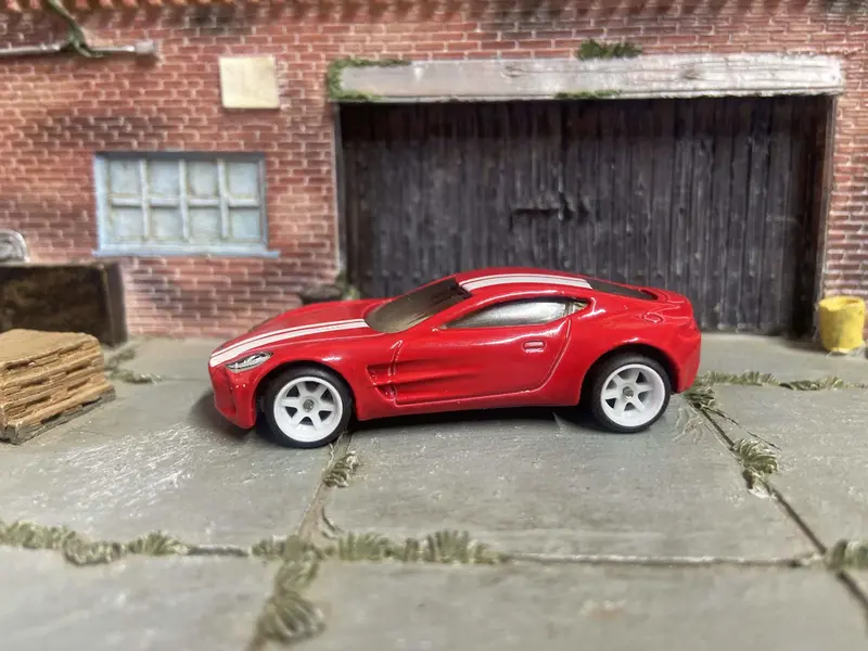 Custom Hot Wheels Aston Martin One-77 Race Car In Red And White With White 6 Spoke Wheels With Rubber Tires 1