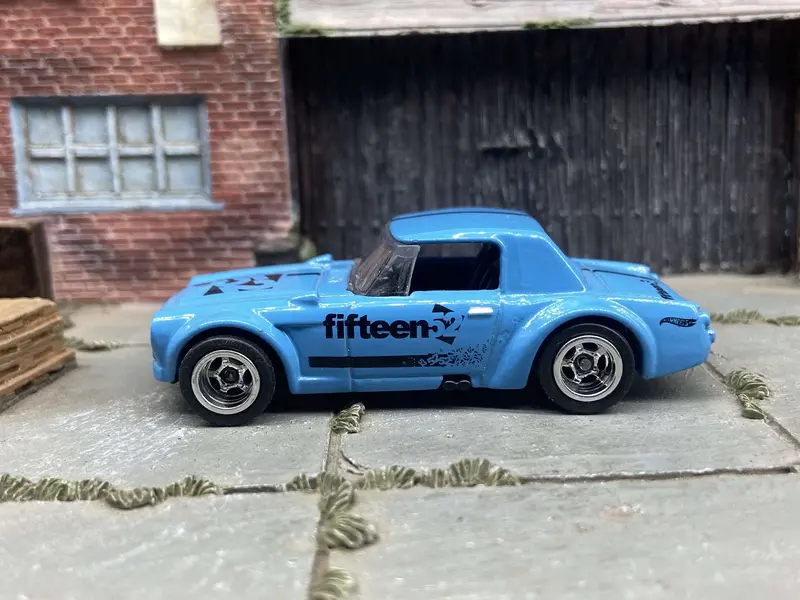 Custom Hot Wheels Fairlady 2000 In Blue And Black With Chrome Deep Dish 5 Spoke Wheels With Rubber Tires 1