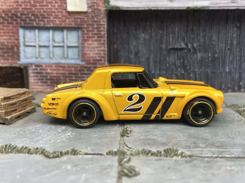 Custom Hot Wheels Fairlady 2000 In Orange And Black With Black And Gold 4 Spoke Race Wheels With Rubber Tires 1