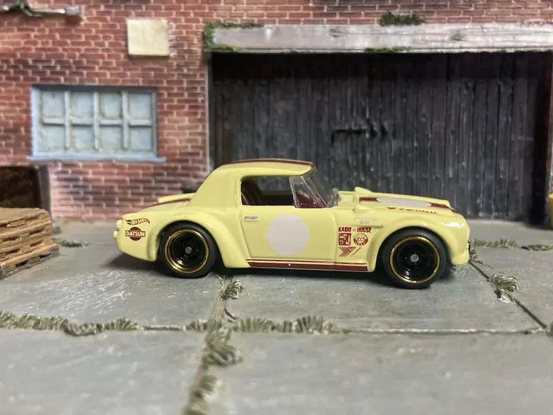 Custom Hot Wheels Fairlady 2000 In Yellow And Red With Black And Gold Race Wheels With Rubber Tires 1