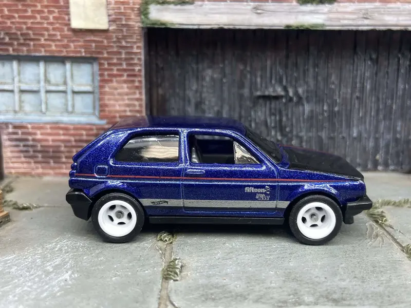 Custom Hot Wheels Vw Volkswagen Golf Mk2 In Blue And Black With White 5 Spoke Wheels With Rubber Tires 1