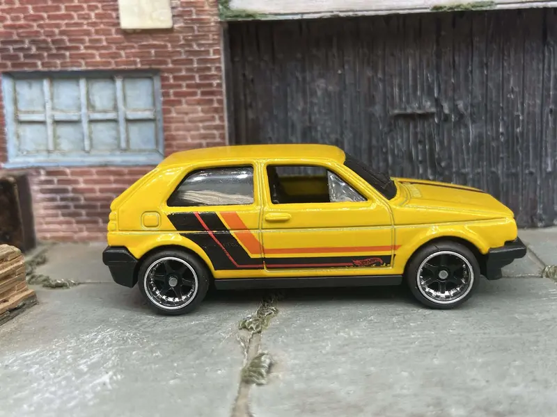 Custom Hot Wheels Vw Volkswagen Golf Mk2 In Yellow, Black And Orange With Black And Chrome 6 Spoke Studded Wheels And Rubber Tires 2