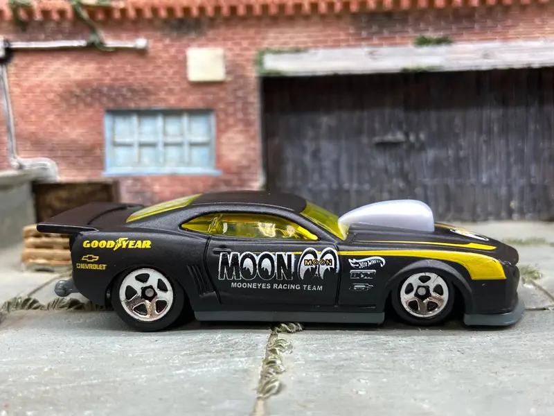 Loose Hot Wheels 2010 Pro-Stock Chevy Camaro Drag Car Dressed In Satin Black And Yellow Mooneyes Livery 1