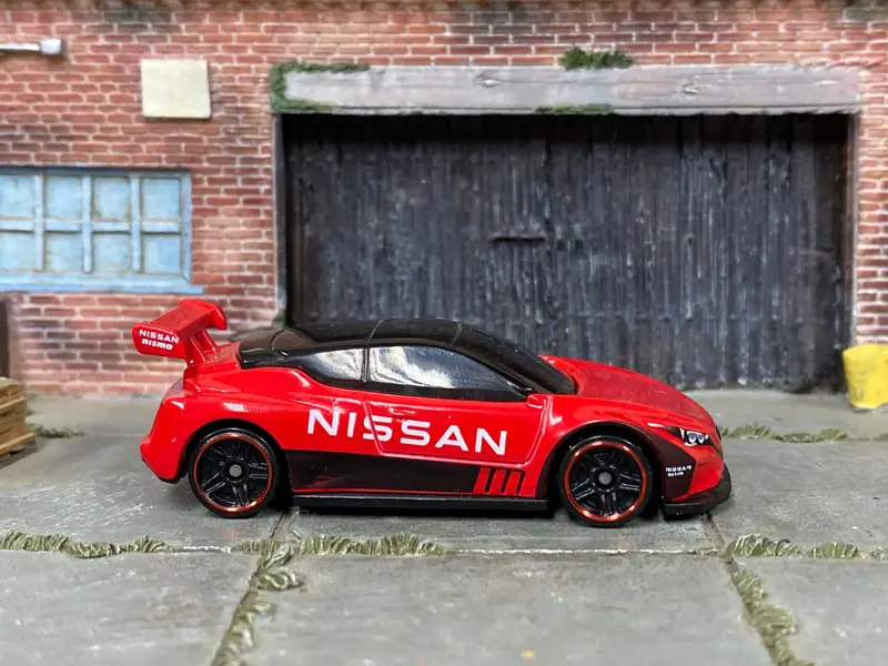 Loose Hot Wheels - Nissan Leaf Nismo Rc02 - Red Nissan Livery 1