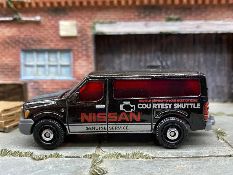 Loose Matchbox - Nissan Nv Van - Black And Silver Courtesy Shuttle 1